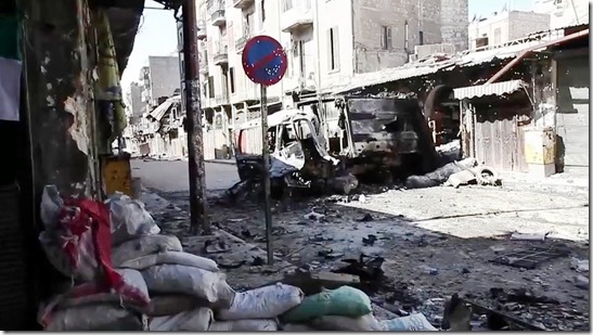 Bombed out vehicles Aleppo Syria