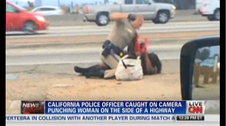 California Patrolman punch woman