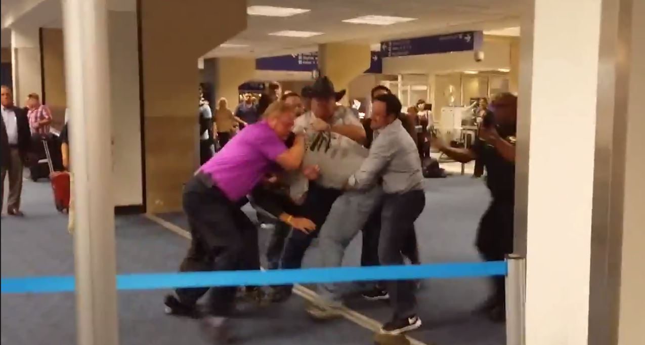 Good Samaritans tackle violent gay basher at Dallas airport