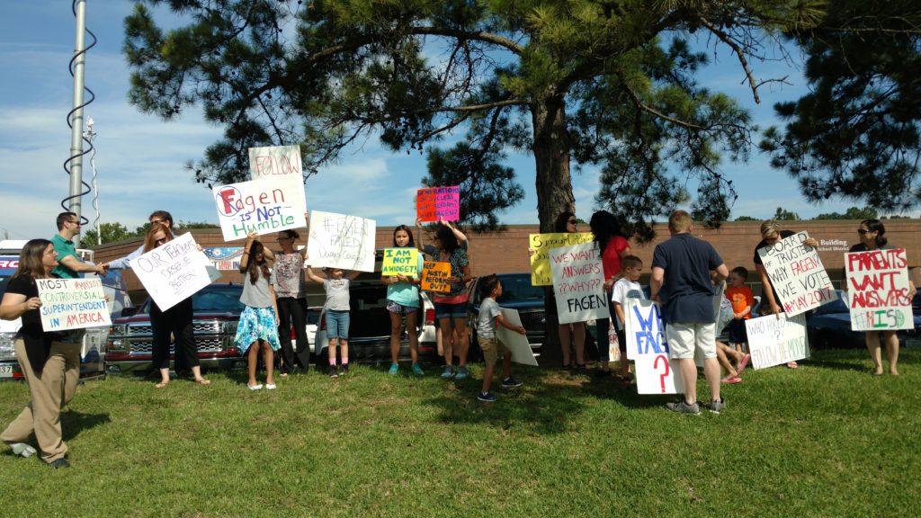 Large crowd of Humble ISD Parents at school board meeting