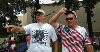 4th of July parade watchers threatning marchers with 2nd Amendment