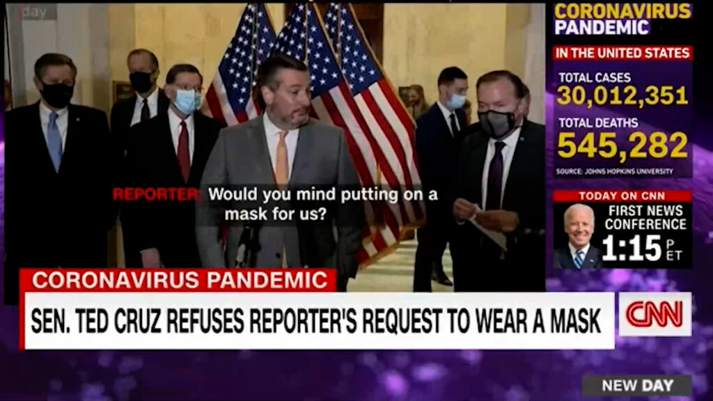 Watch an obstinate Ted Cruz refused to put on a mask when a reporter asked him.
